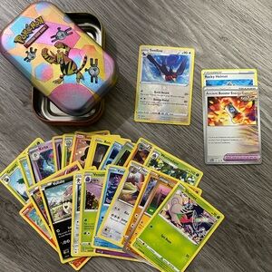 27 Card Pokémon Bundle with Tin Including Reverse Holo and 2 Rares